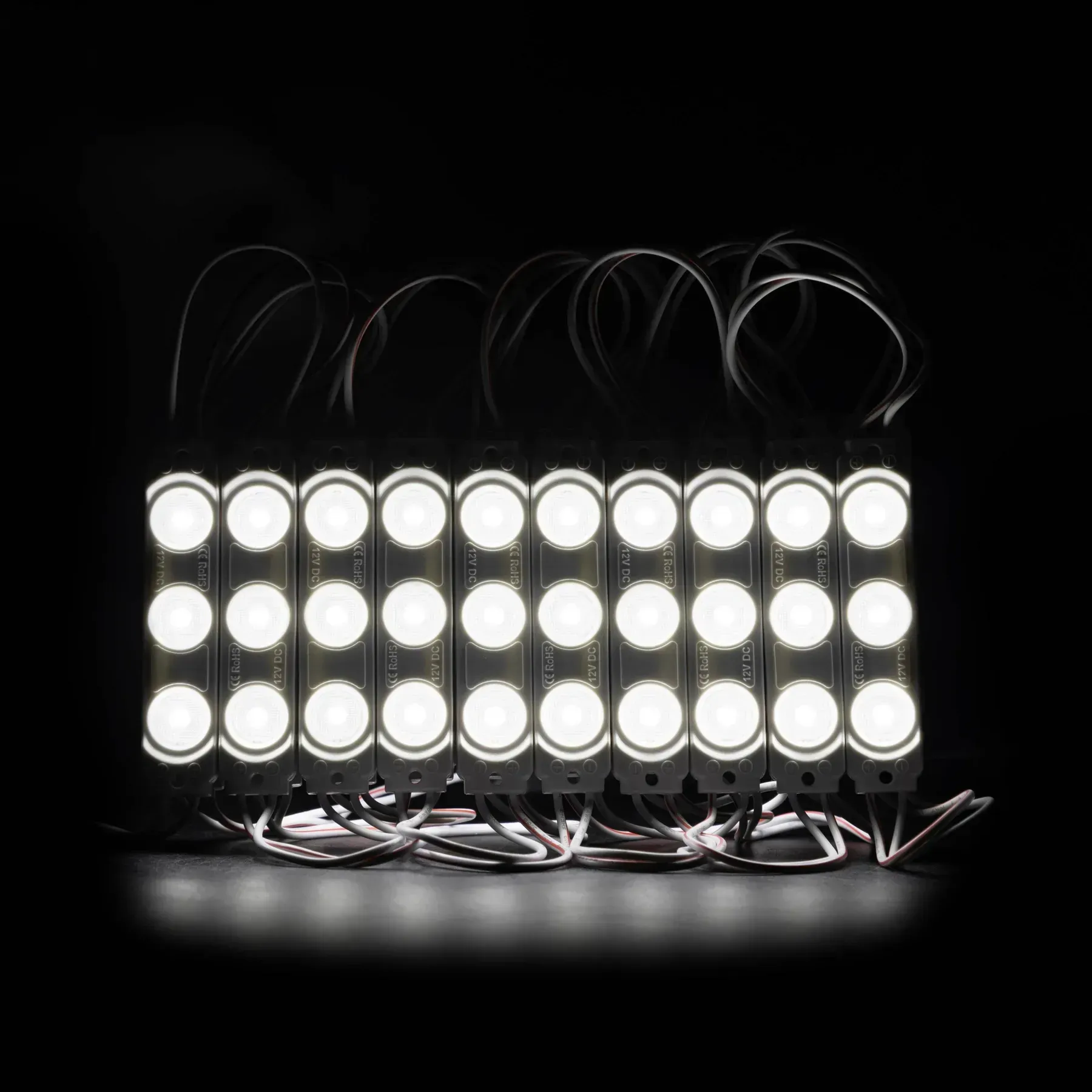 Світлодіодний модуль PROLUM V2 SMD2835 0.72W PROLUM V2, LED модуль, світлодіодний модуль, SMD2835, 0.72W, 12V, IP67, холодний білий, модуль для вивісок, модуль для реклами, модуль з лінзою, герметичний LED модуль.